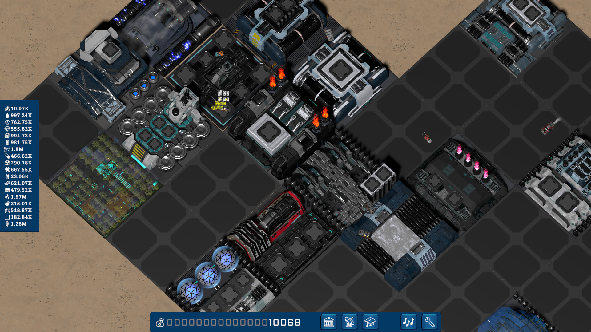 Idle Terra 夜晚的遊戲場景，建築物燈火通明。