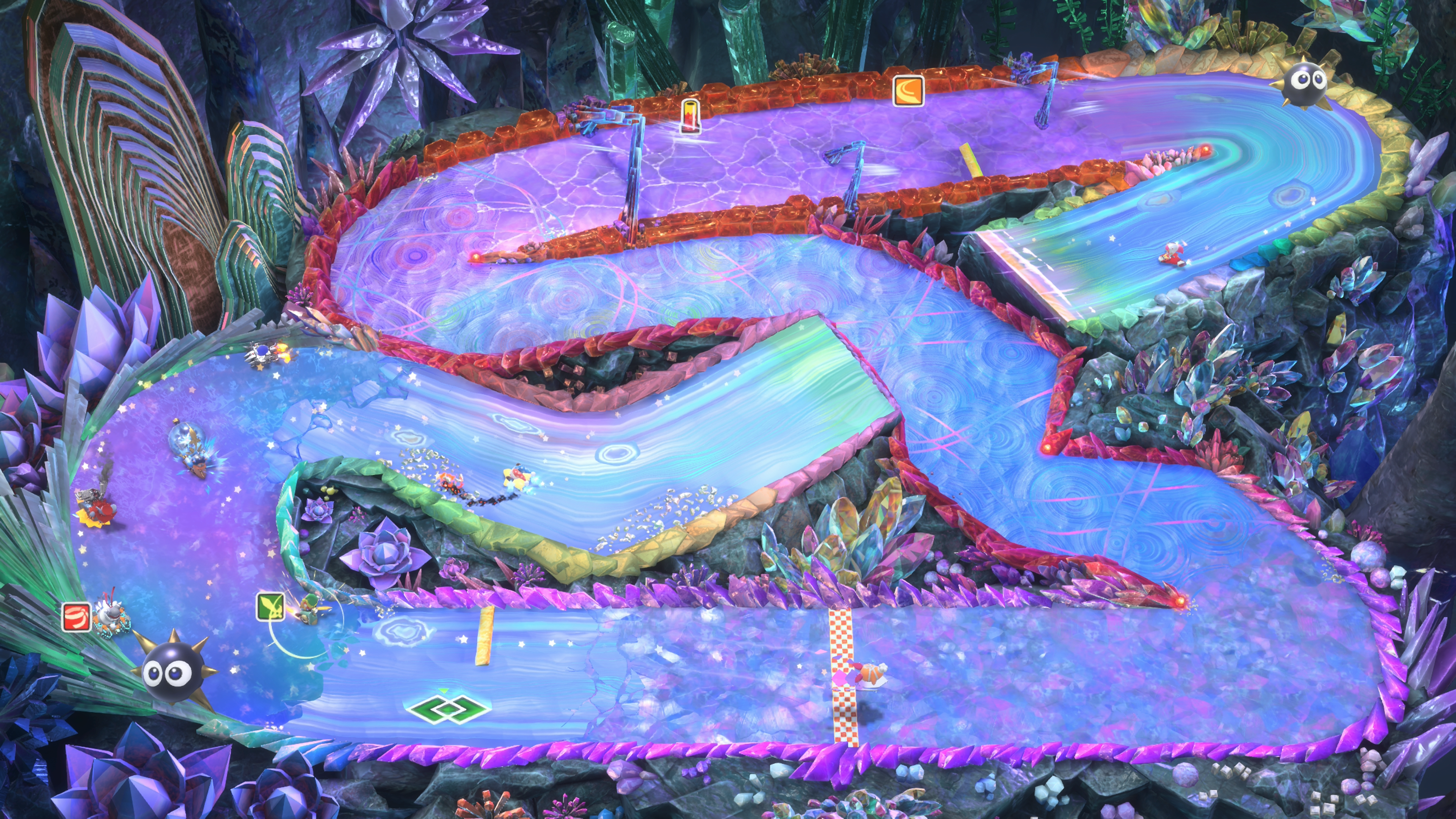 八名玩家在色彩繽紛的賽道上進行激烈的俯視角競速。