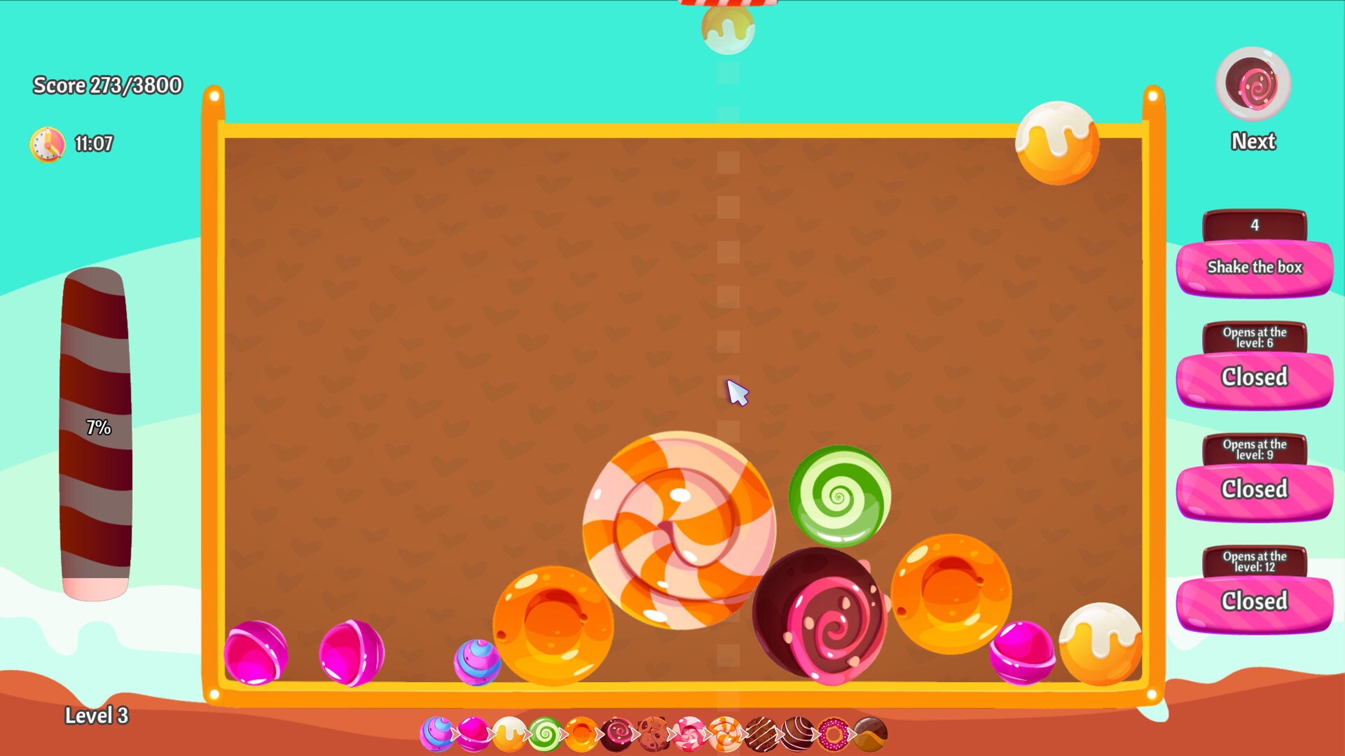 色彩繽紛的糖果在遊戲區域中滾動與碰撞。