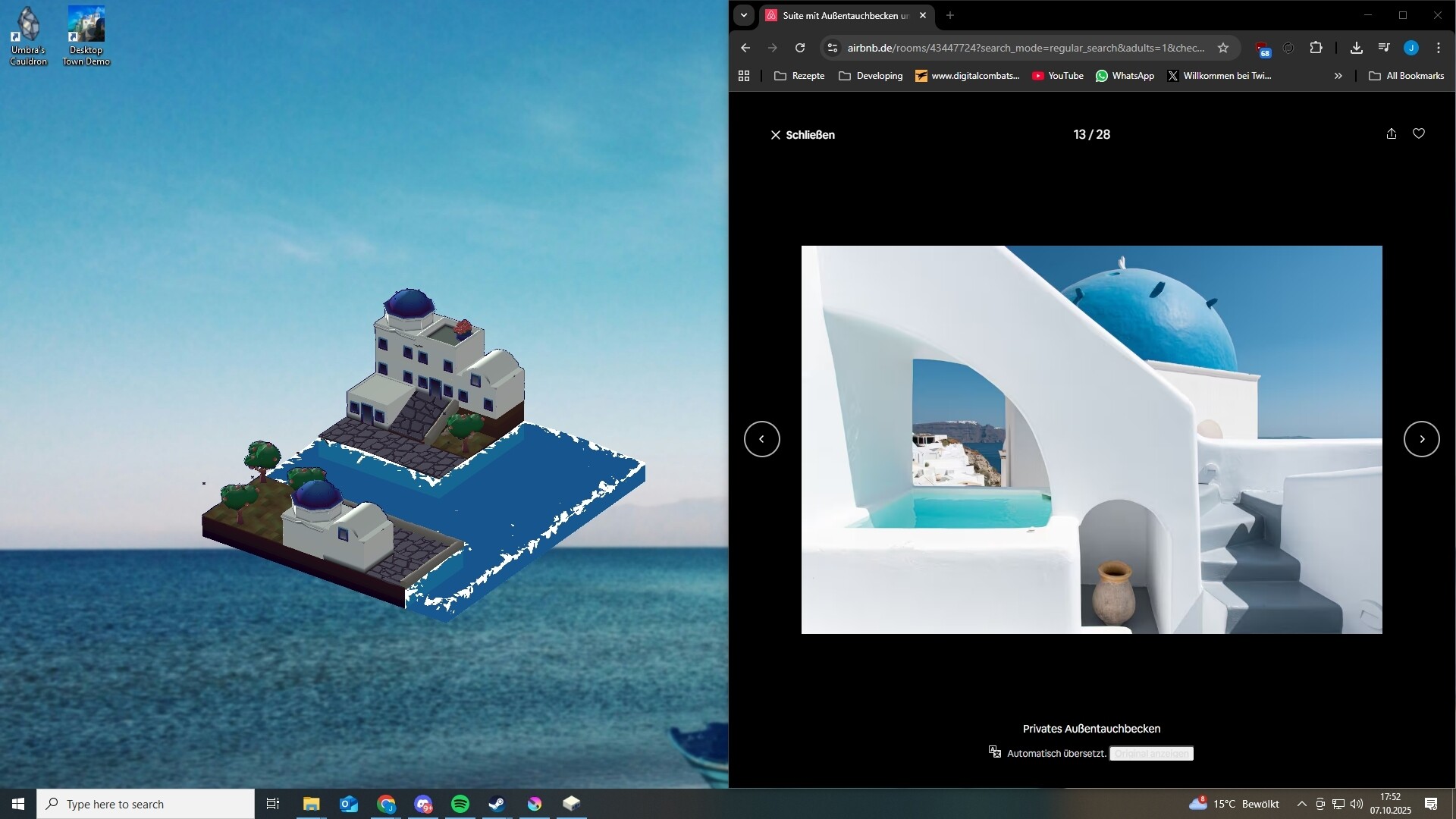 另一個角度的小鎮截圖，展現了河流、橋樑和多層次的建築佈局。
