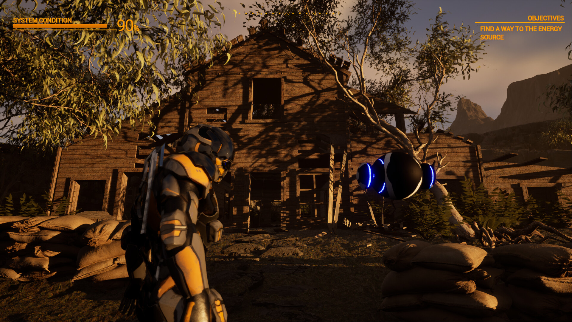 主角站在一個廢棄的工業設施中,望向遠方。